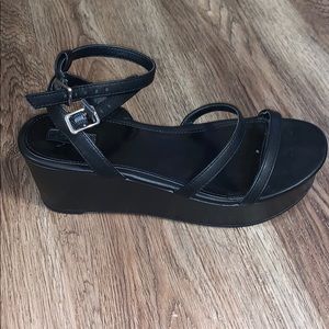 Black strappy platform shoes